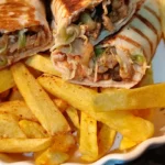 Grilled tortilla wraps served with fries 