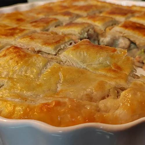 Close up image of chicken pot pie with puff pastry