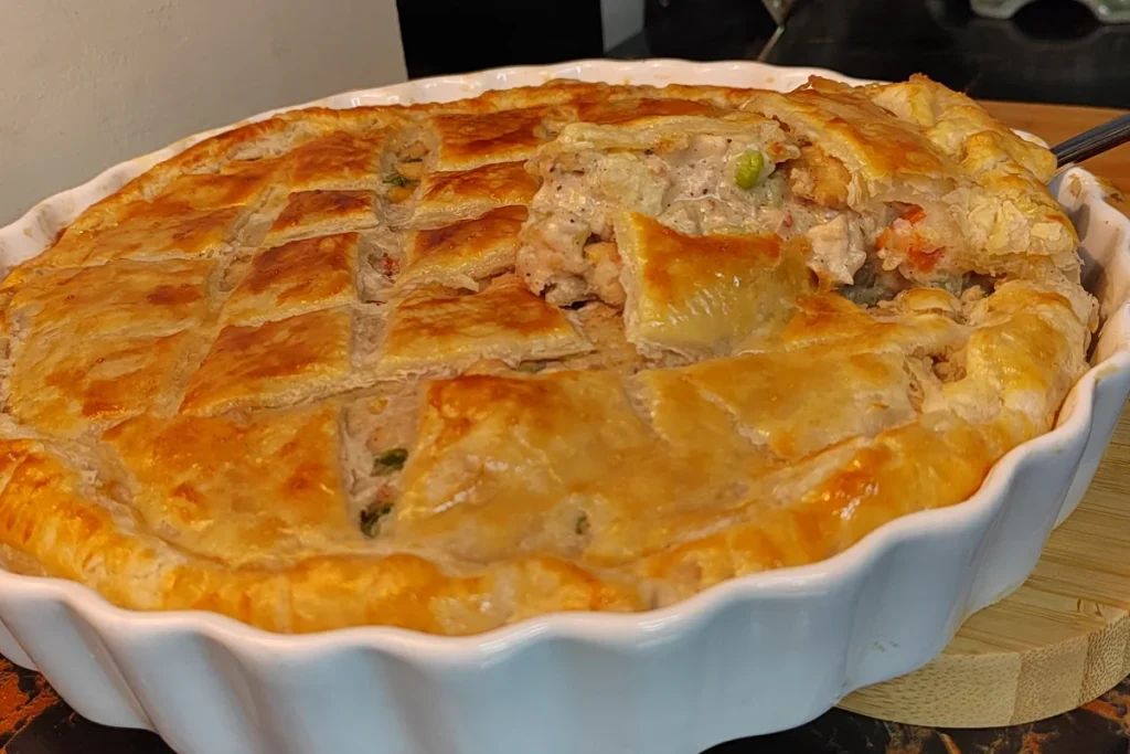 Puff Pastry Chicken Pot Pie In a White Pie Dish