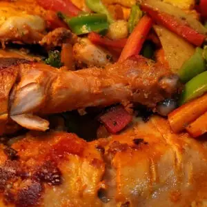Smoked Chicken Tandoori served with sautéed vegetables like carrot, broccoli, potatoes and capsicum